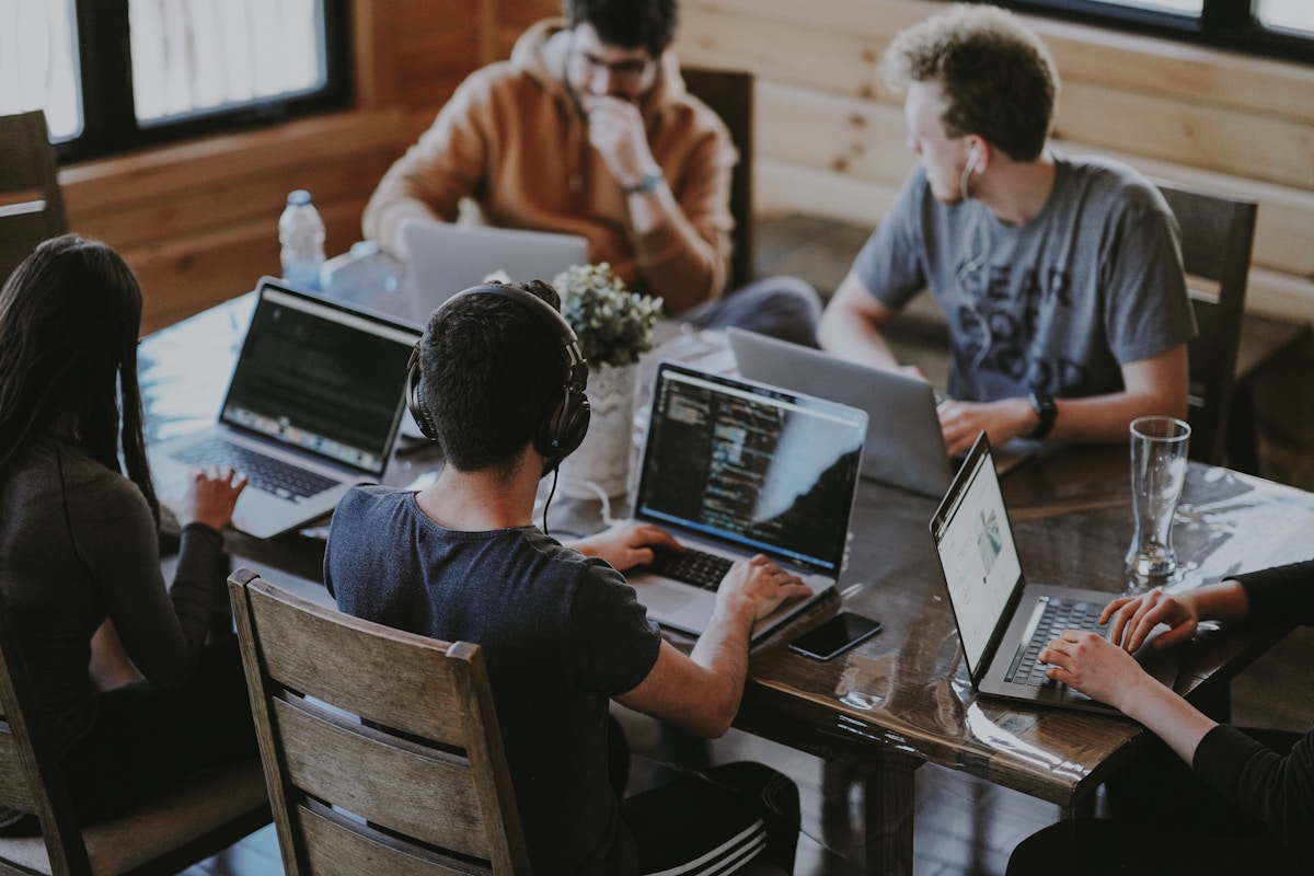Traders collaborating and getting started with White Bridge
